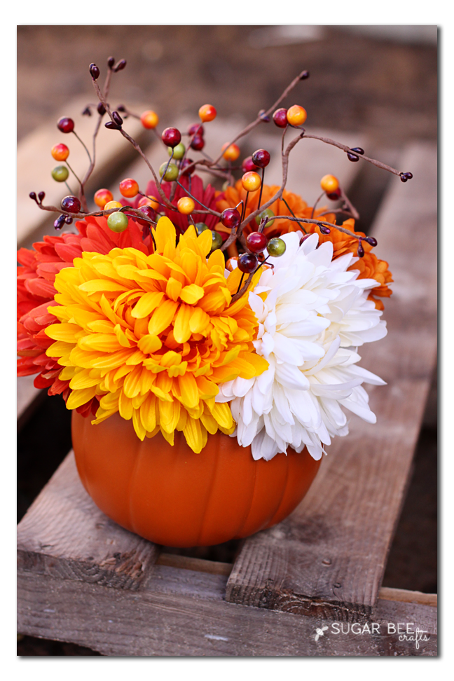 fall flowers in a pumpkin - cute craft idea!