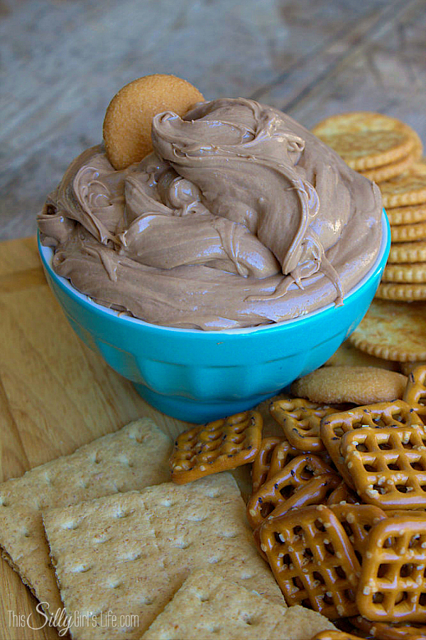 Creamy Nutella Peanut Butter Dip, a sinfully sweet dip to serve as an appetizer or dessert! - ThisSillyGirlsLife.com