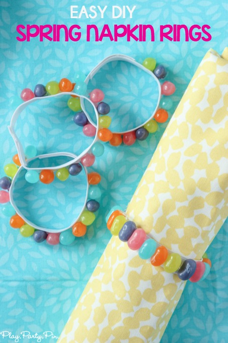 Easy DIY spring napkin rings made from a little bit of elastic, jelly beans, and hot glue. Perfect addition to any spring party!