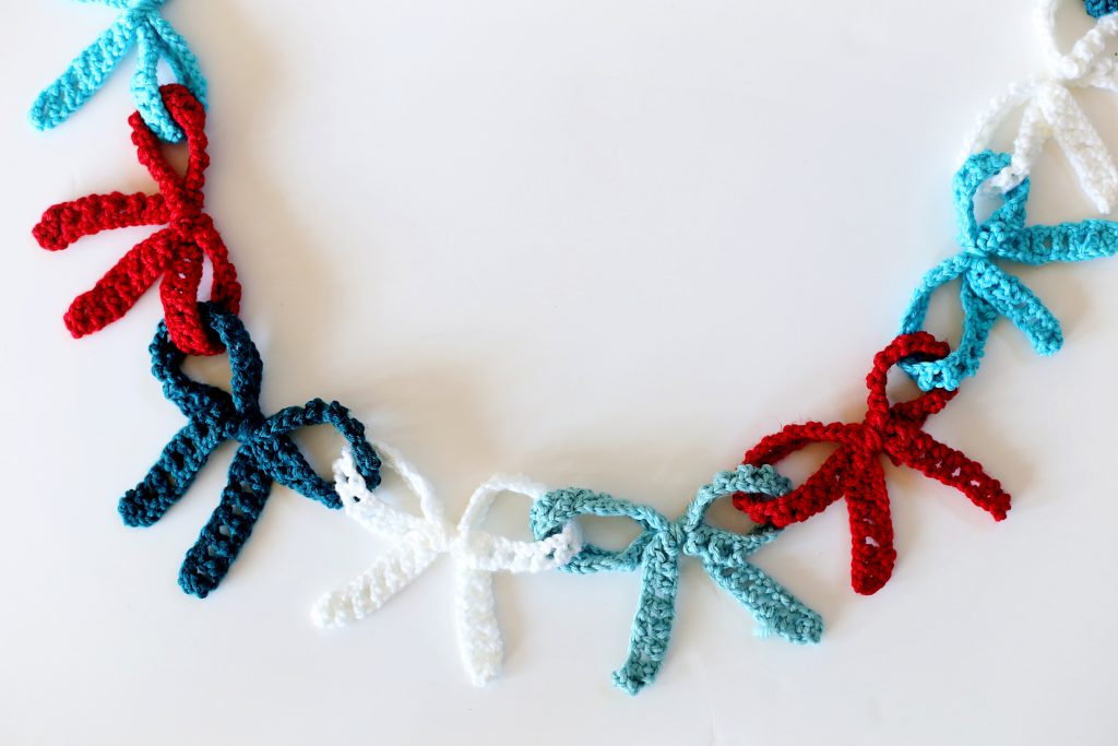 Crochet Bow Christmas Garland Idea by Mandy Beyeler