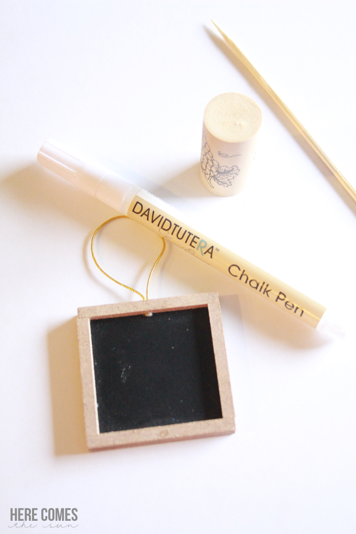 Create these fun and festive chalkboard and wine cork place cards for your Thanksgiving table. 