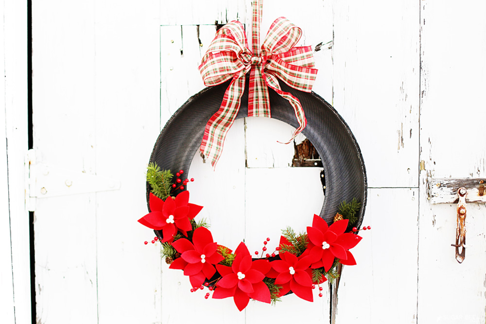 DIY Holiday Poinsettia Tire Wreath by Mandy Beyeler
