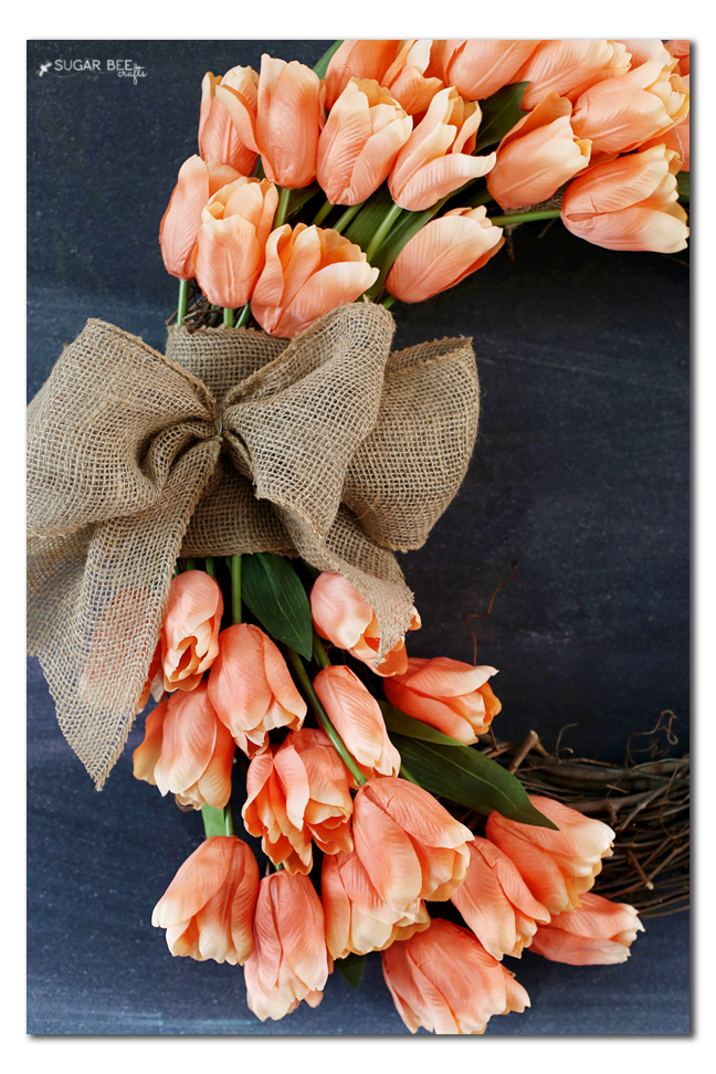 faux tulips into wreath