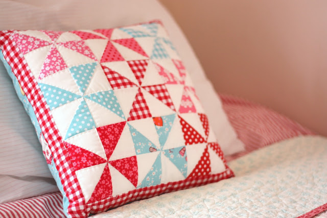 red pink aqua pinwheel quilt pillow